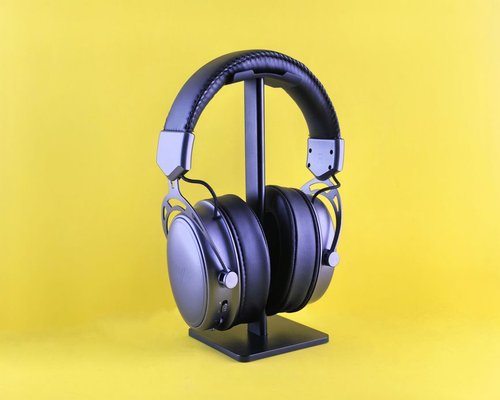 Premium spatial audio gaming headset on a stand